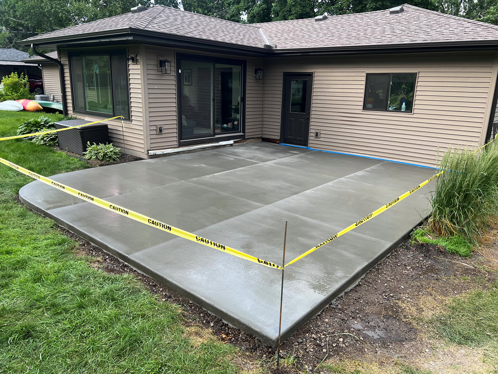 New concrete patio at Golden Valley home by Creative Concrete Inc New concrete patio at Golden Valley home by Creative Concrete Inc