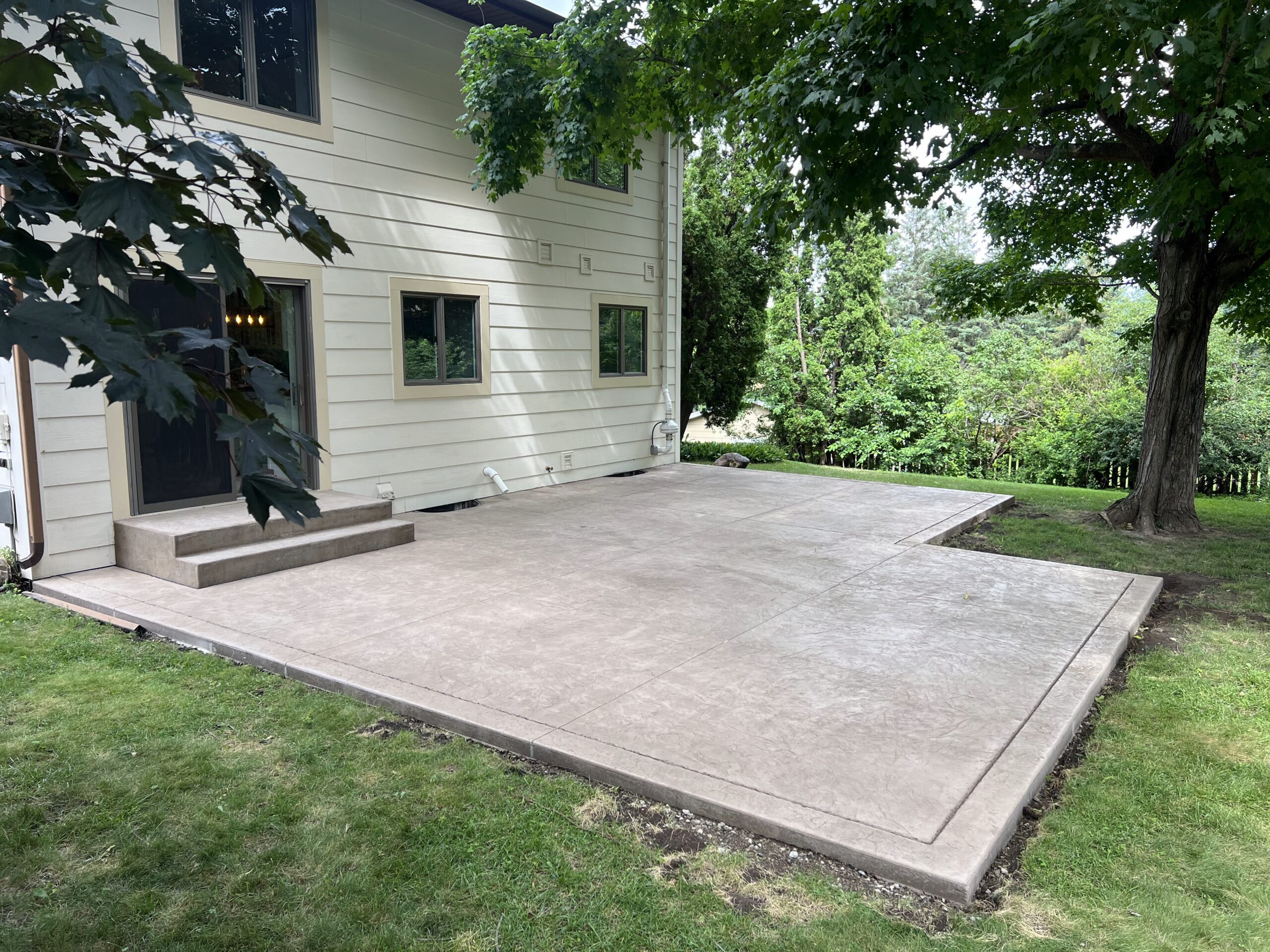 Stamped concrete patio installed in Bloomington by Creative Concrete Inc