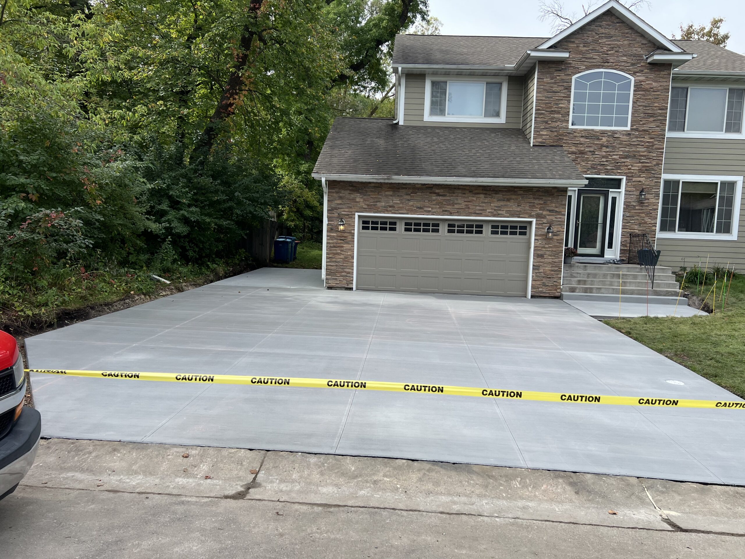 Poured concrete driveway installed in Plymouth MN by Creative Concrete Inc Poured concrete driveway installed in Plymouth MN by Creative Concrete Inc